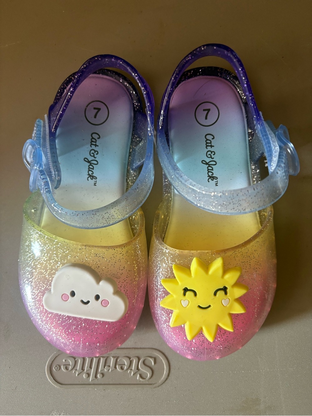 Cat & Jack Kids' Glitter Jelly Shoes with Sun & Cloud Charms, Multicolor